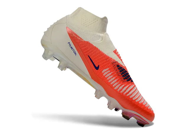 Nike Phantom 6 DF Elite Football Cleats in a dynamic pose, showcasing agility and speed on the field