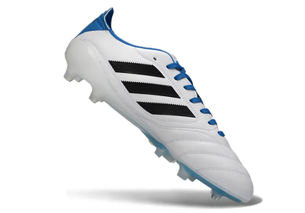 Soccer player wearing Adidas Copa Icon II Elite FG cleats, showcasing agility and speed on the field