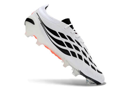 Adidas Predator 26 Elite FG football boot in action on a green grass field