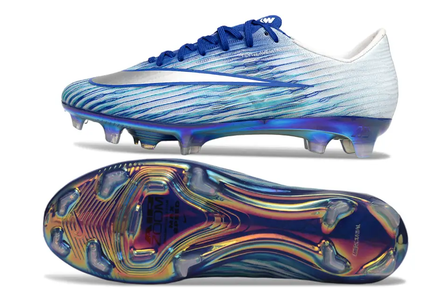 Elite soccer player wearing Nike Air Zoom Mercurial Vapor XVII Elite FG cleats, highlighting speed and power