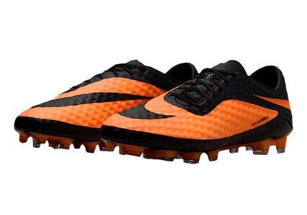 Side view of Nike Hypervenom Phantom RGN Bright Citrus Elite FG football boots in vibrant orange with black accents – elite firm ground soccer cleats